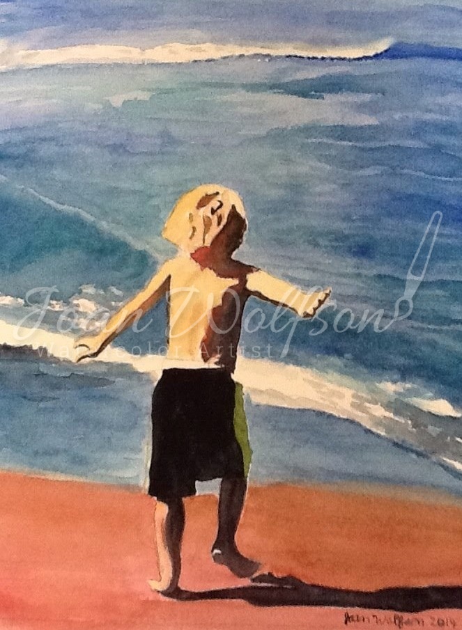Little boy running on beach